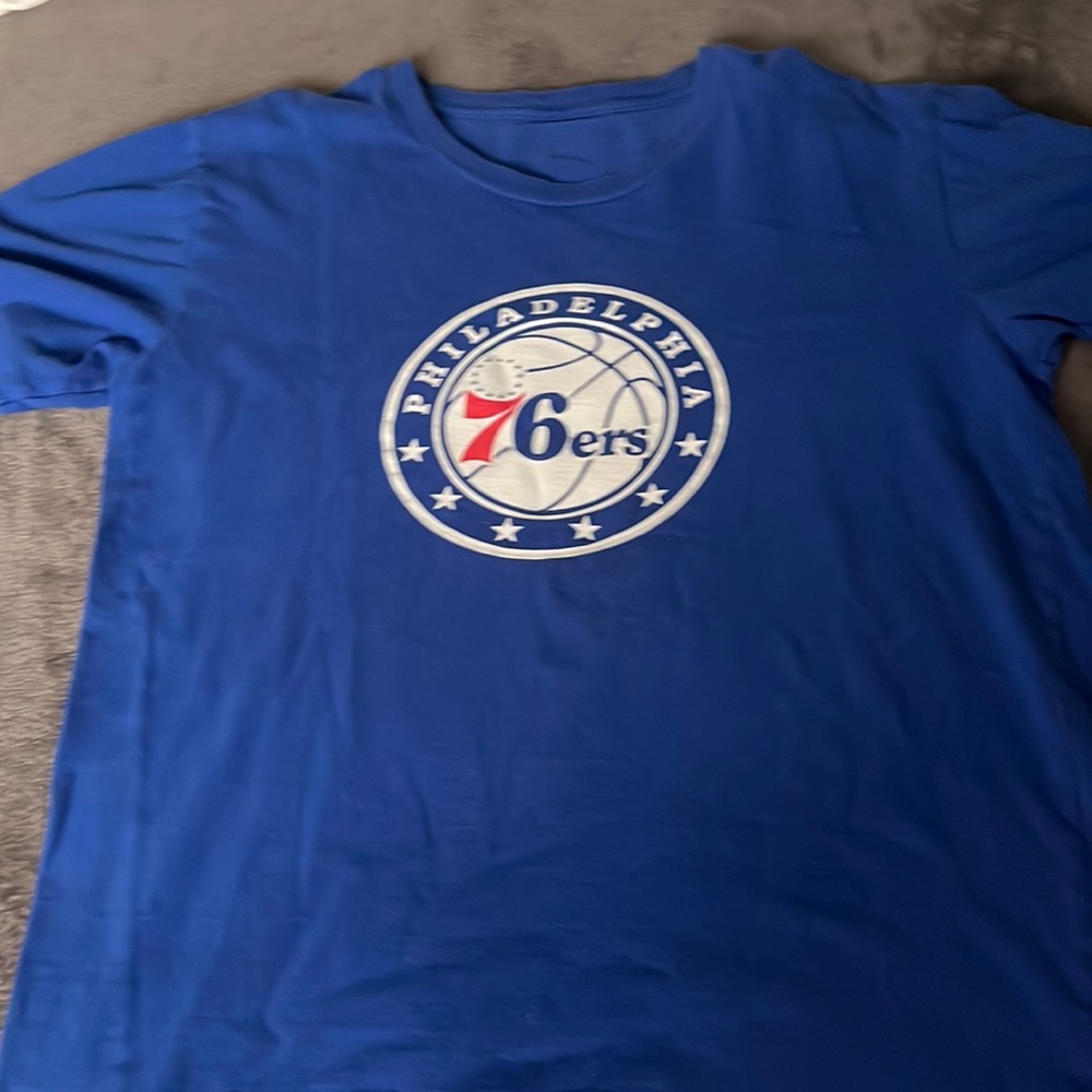 Joel Embiid #21 on Philadelphia 76ers Unisex T-Shirt.